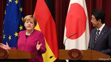Главы правительств Германии и Японии обсуждали Россию 