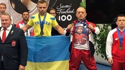 Российского спортсмена дисквалифицировали за футболку с изображением Путина