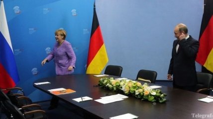 Меркель обсудит с Путиным вопрос об Украине   