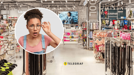 Удивленная женщина и магазин одежды