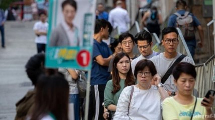 Выборы в Гонконге: избиратели демонстрируют рекордную явку