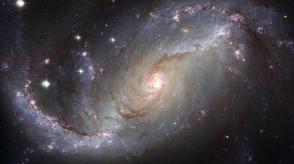 NASA: Hubble сделал первые фото "спиральных рукавов" галактики в созвездии Волосы Вероники