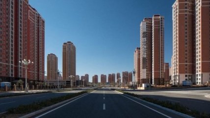 Китайский "город будущего", который превратился в крупнейший город-призрак (Фото)