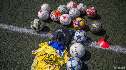 В Китае, во время перерыва в матче, охрана избила дубинками футболистов