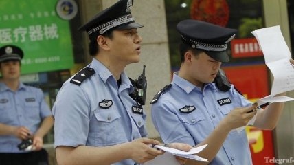 Китаец получит почти $100 тысяч за помощь полиции