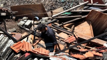 В Шри-Ланке гора мусора накрыла 40 домов, есть погибшие и раненые