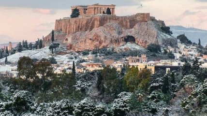 Пальмы и апельсиновые деревья в снегу: в Афинах настоящая зима (Видео)
