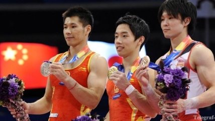 Китаец выиграл золото в вольных упражнениях