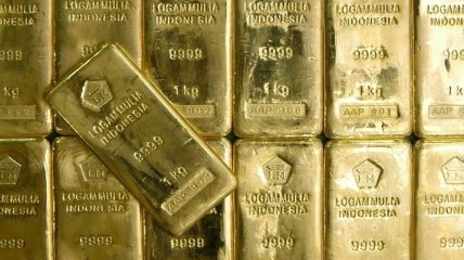 Банк CIBC снизил прогноз цен на золото и серебро на 2012 год