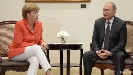 Путин и Меркель обсудили мирное урегулирование конфликта в Украине