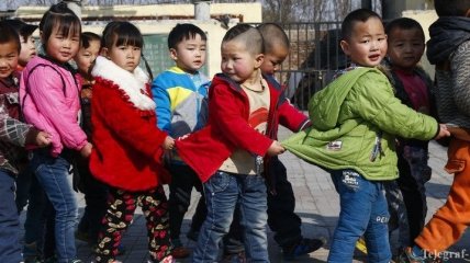 Китай отказался от политики "Одна семья - один ребенок"