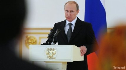 Путин хочет смягчить наказание за взятки