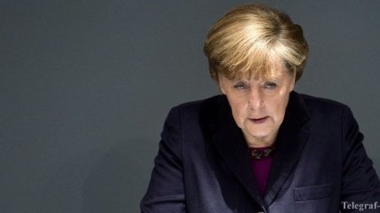 Меркель:  Ситуацию в Украине нужно урегулировать мирным путем