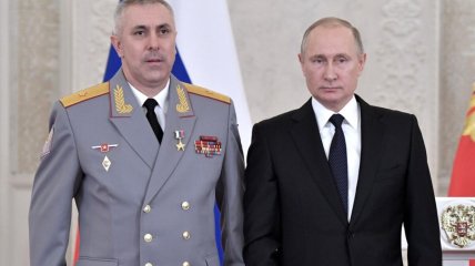 Звільнений Рустам Мурадов і президент РФ Володимир Путін