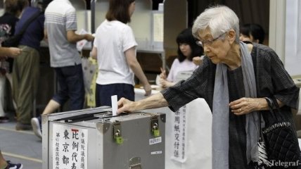 Япония, как и Украина сегодня выбирает парламент