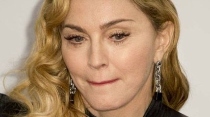 Фотограф запечатлел Мадонну в пикантной ситуации