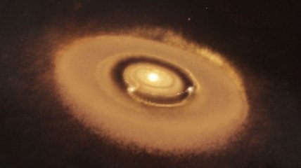 Появились четкие снимки рождения планет в облаке вокруг далекой звезды