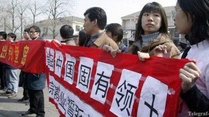 Массовые беспорядки остановили строительство завода в Китае
