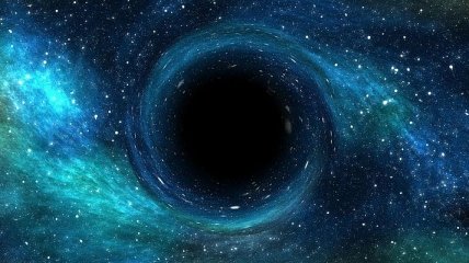 Астрономы обнаружили самую древнюю и тяжелую черную дыру
