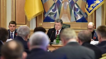 Порошенко призвал ускорить процедуру предоставления участника АТО