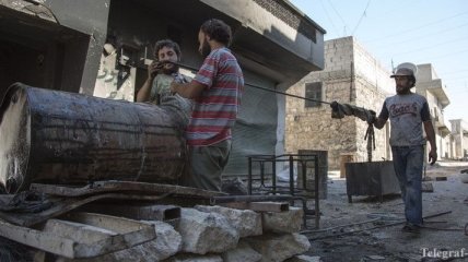 Первый конвой с спасенными людьми в Алеппо достиг территории повстанцев