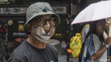 Жители Гонконга выступают против запрета на ношение масок (Фото)