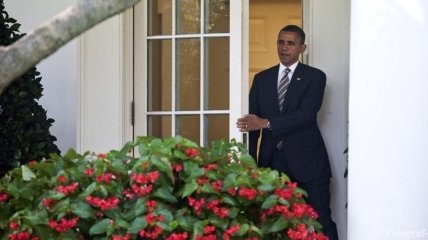 Обама отменил из-за шторма "Сэнди" предвыборные поездки