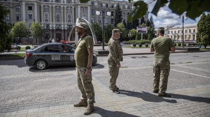 Работники ТЦК