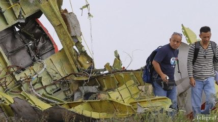 В Интерполе идентифицируют погибших в сбитом на Донбассе самолете