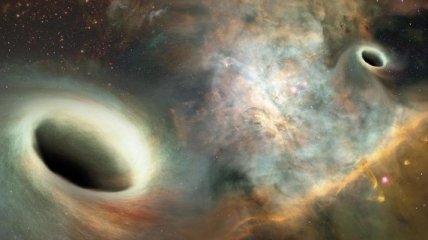 Ученые впервые обнаружили две спаренные черные дыры