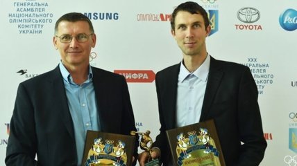 Легкоатлет Бондаренко и борец Беленюк получили награды НОК Украины