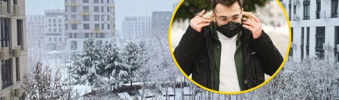 Зимний город, мужчина в маске