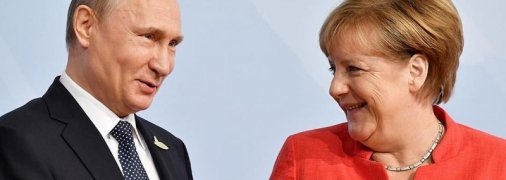 Путин пожаловался Меркель на Украину