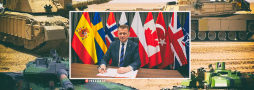 Министр обороны Польши Мариуш Блащак провел переговоры о танках на фоне флагов стран-союзников