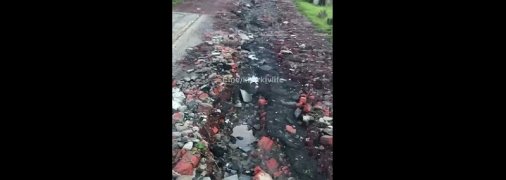 Ямы по щиколотку: в Харькове ливнем смыло дороги (видео)