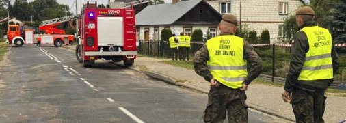 Поврежденный после атаки дом в Польше