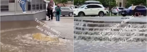 Вода біжить вулицею через прорив