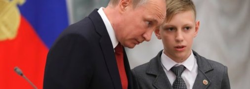 Володимир Путін із дитиною