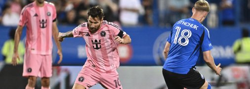 Ліонель Мессі та Геннадій Синчук