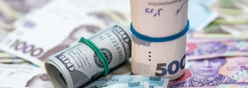 Гривня та долар