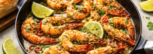 Креветки у винному соусі