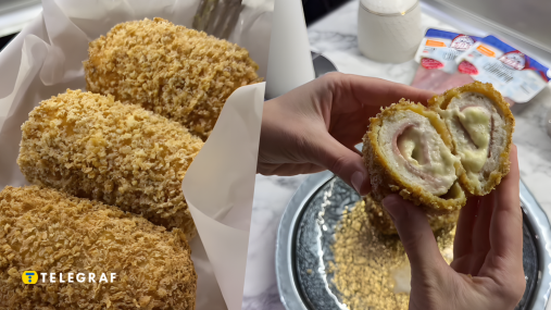 Вкуснее обычных и намного сочнее: как приготовить куриные котлеты с ветчиной и сыром (видео)